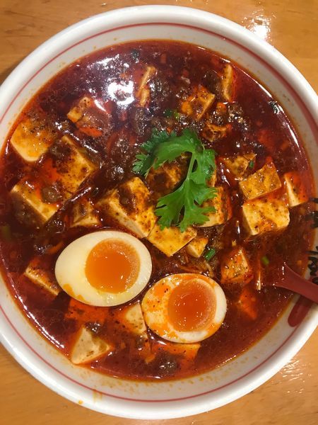 「麻辣麻婆豆腐麺850円 味玉100円 3辛90円  1,014円」@匠Jang 横浜ポルタ店の写真