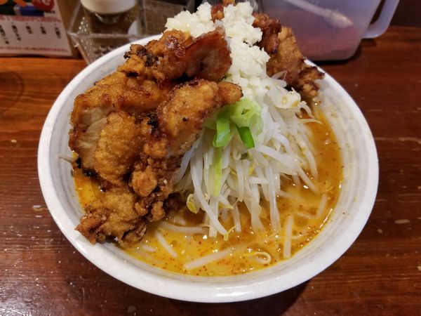 「旨辛味噌DX+唐揚げ1本[イベント無料](980円)」@旨辛ラーメン表裏 高田馬場店の写真