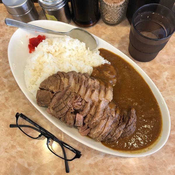 「カレー豚一本」@肉汁らーめん 公 kimiの写真