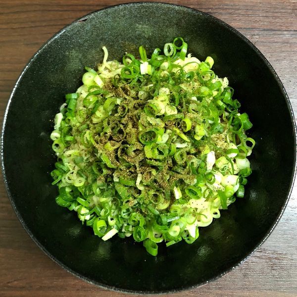 「汁なし担担麺 大盛 (640円) ネギ大盛り (50円)」@花山椒 大手町店の写真