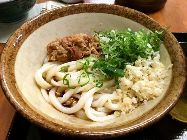 「サッポロ黒生中瓶→肉ぶっかけ」@いぶきうどん 吉祥寺店の写真
