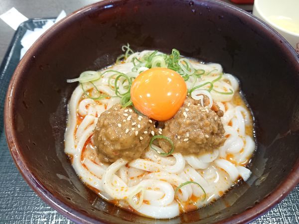 「冷やし担々うどん(並)490円＋こだわり卵（クーポン）」@なか卯 ひばりが丘店の写真