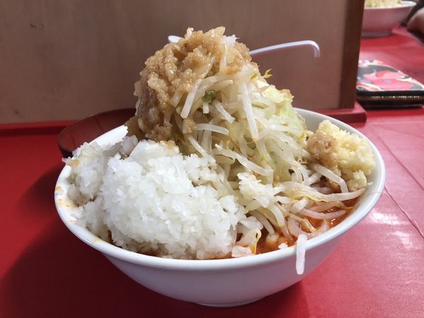 「辛ラーメン タマネギ、生玉子」@らーめん 武丸の写真