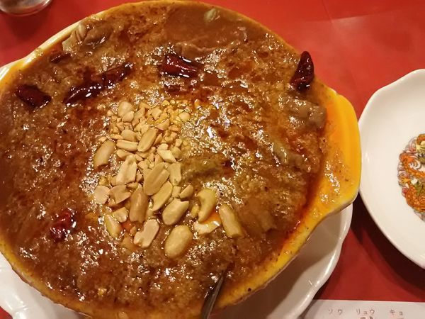 「牛肉の四川風煮込み（玉子麺付き）￥1,100」@双龍居の写真