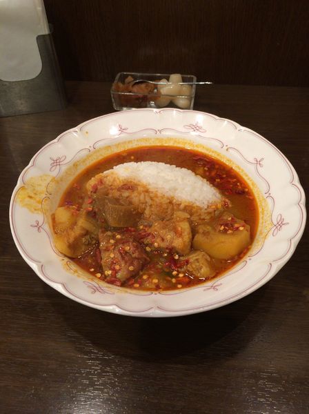 「インド風ポークカレー大辛」@トプカ 淡路町本店の写真