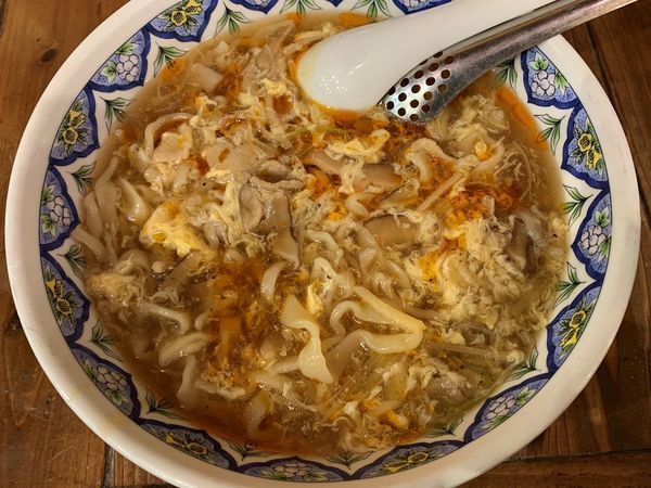 「スーラータンメン（刀切麺）」@中国ラーメン揚州商人 飯田橋ラムラ店の写真