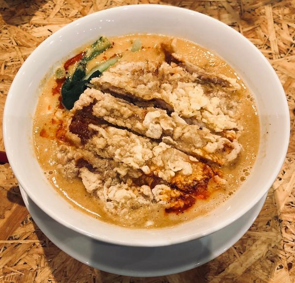 「排骨担々麺（辛さ控えめ・固め・￥1080）」@担担麺 ごまる 銀座店の写真