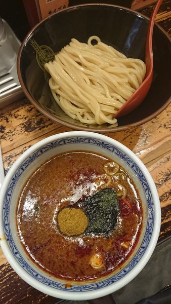 「灼熱」@つけ麺専門店 三田製麺所 池袋西口店の写真