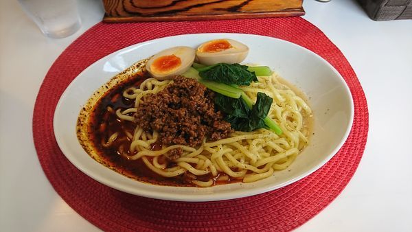 「濃厚汁なし担担麺 味玉」@麺や金時の写真