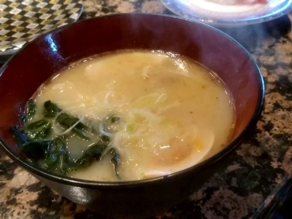 「魚介とんこつラーメン411円」@がってん寿司 富岡店の写真