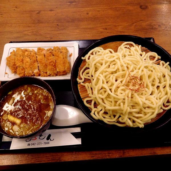 「魚介豚骨カレーつけ麺（670円）とろ肉カツ（330円）各税別」@カレー・つけ麺 とろとんの写真