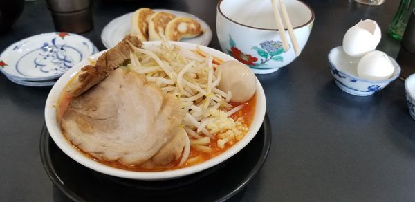 「極太麺（辛味噌）、味玉、サービスギョーザ」@麺屋 とん嬉の写真