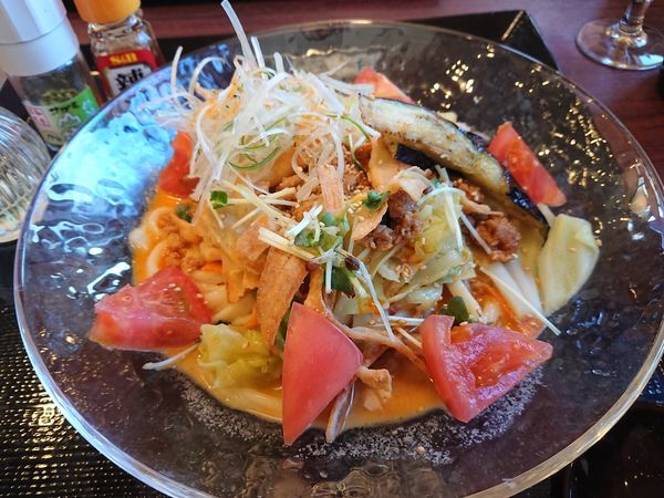 「冷やし担々うどん 1134円」@味の民芸 アクロスプラザ東久留米店の写真