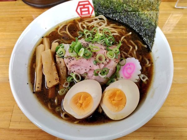 「期間限定 沖縄ブラックラーメン」@百年本舗 沖縄西原店の写真