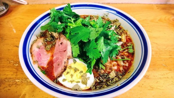 「【期間限定】curry担々麺+パクチー増し」@口樂の写真