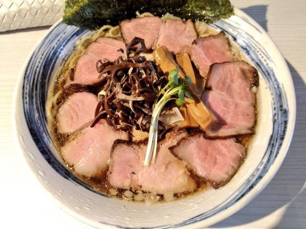 「期間限定 あぐ〜豚背脂こってり 豚バラ肉入り 肉中華蕎麦」@麺や 堂幻の写真