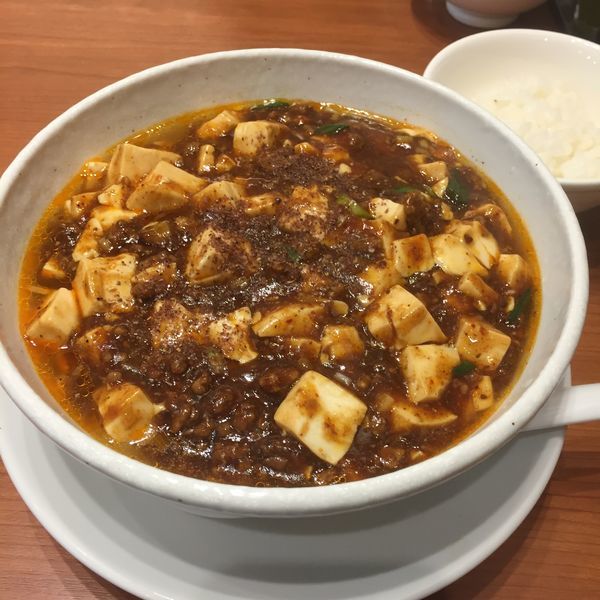 「麻婆麺  普通辛  サービスライス」@SHIBIRE NOODLES 蝋燭屋 表参道ヒルズ店の写真
