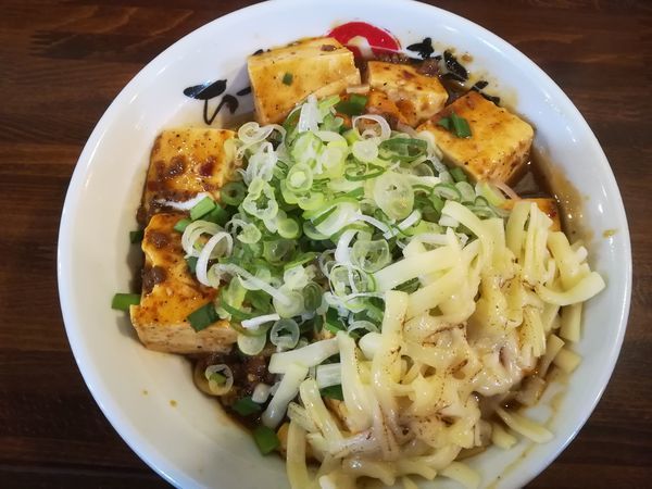 「男気麻婆＋炙りチーズ」@まるはち 春日井店の写真