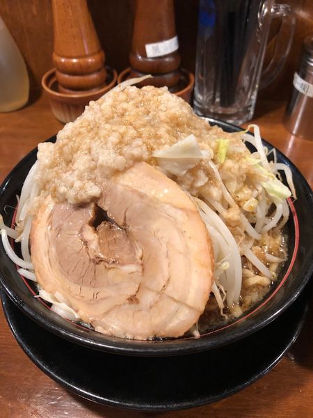 「ラーメン700円ヤサイアブラ多め生卵50円」@肉そば千の写真