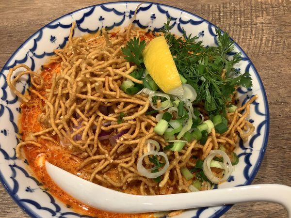 「カオソイ（チキンカレーラーメン954円）」@サイアムオーキッド 横浜ポルタ店の写真