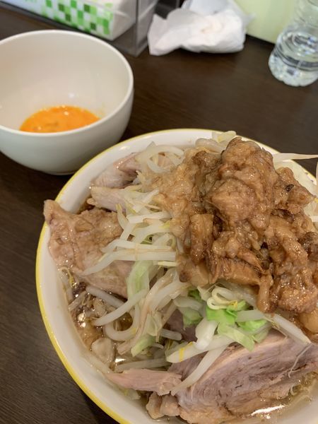 「ラーメン 並ブタ + 生卵　1150円」@ラーメン イエロー 御徒町店の写真