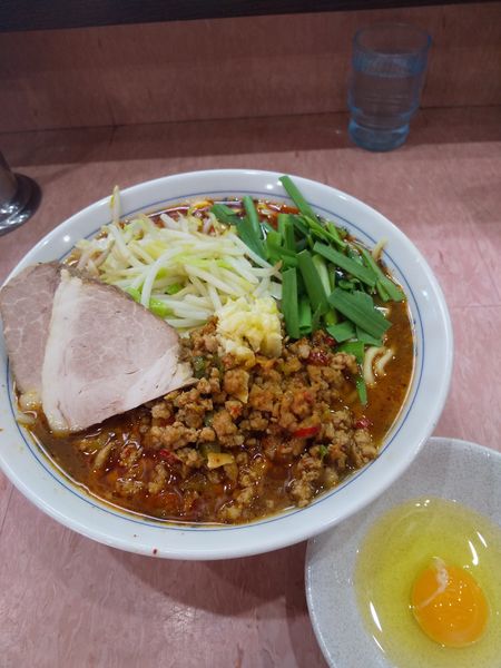 「【10食限定】台湾ラーメン840円生玉子50円(麺カタメ)」@所沢大勝軒の写真