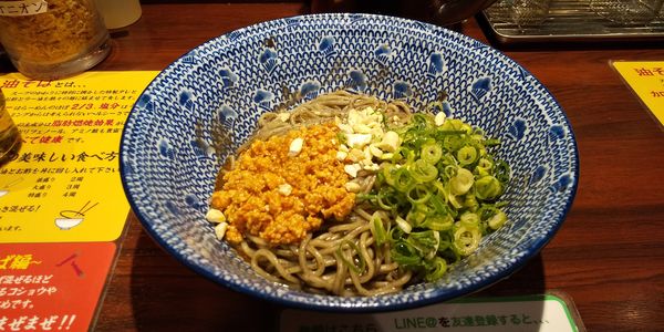 「スパイシーブラック汁なし坦々麺(限定)」@東京煮干屋本舗 中野駅前店の写真