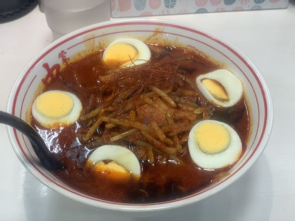 「限定焦がし味噌卵麺(辛さ5倍＋こんにゃく麺変更)」@蒙古タンメン 中本 西池袋店の写真