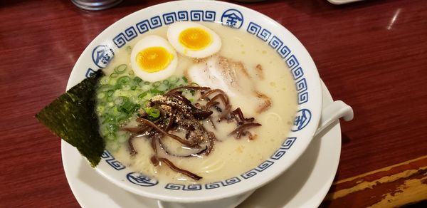 「まるきんラーメン+半熟玉子」@博多まるきんラーメン 雪谷店の写真