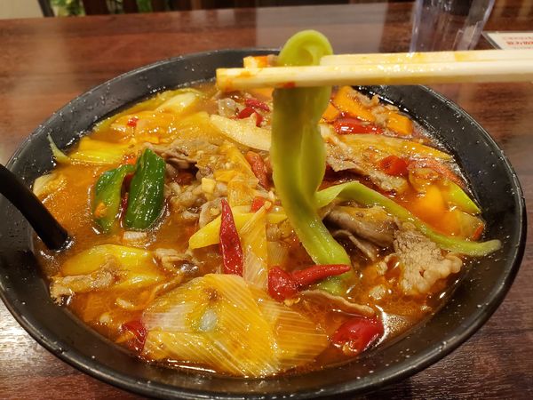 「泡椒羊肉面＋青汁刀削麺変更」@川味の写真