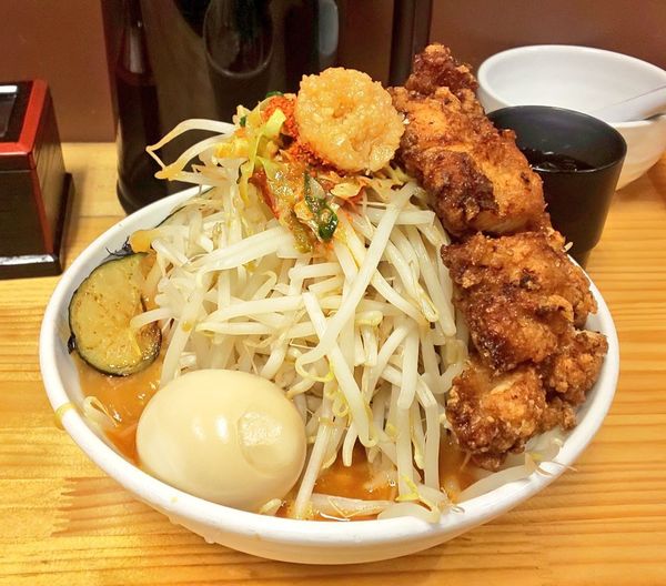 「極辛あんかけDX（メガ唐付) 麺中盛+サービス味玉」@旨辛ラーメン 表裏 市ヶ谷本店の写真
