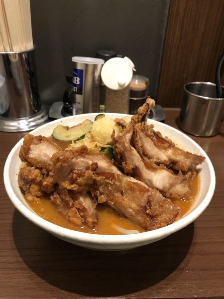 「あんかけDX＋味玉」@旨辛ラーメン 表裏 水道橋店の写真