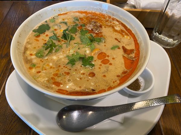 「1/12 痺れ担々麺1100円」@アジアンビストロ Dai 新百合ヶ丘店の写真