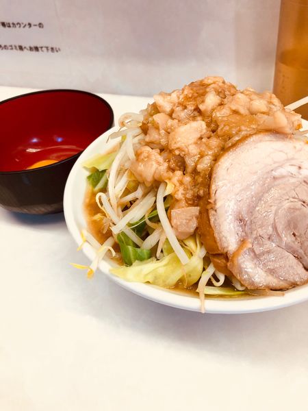 「ミニラーメン+生卵」@魔人豚の写真