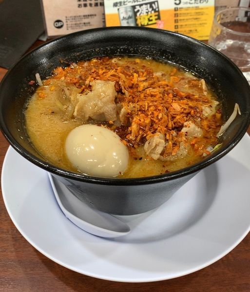 「ぶたみそ 煮玉子 やみつきスパイス」@ラーメンばんだいの写真