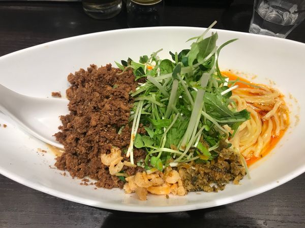 「つゆ無し坦々麺（3辛2痺）」@四川担担麺 阿吽 キッテグランシェ店の写真