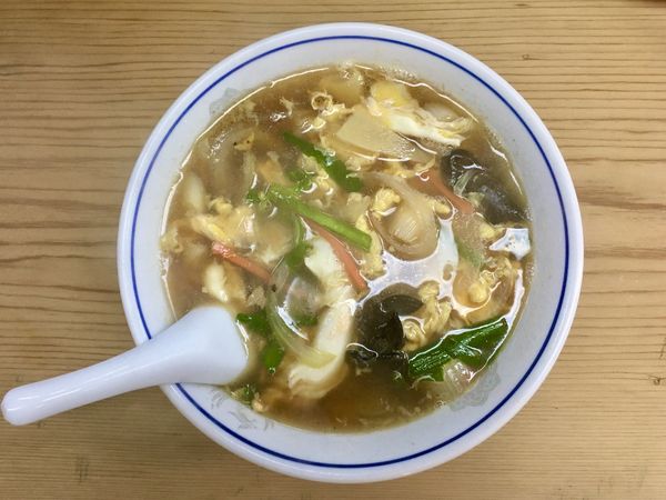 「サッポロ生ビール黒ラベル大瓶 → 玉子そば」@七面鳥の写真