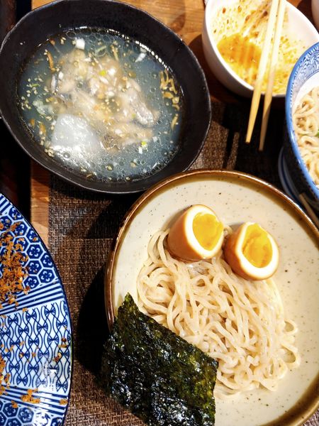 「手羽先の牡蠣つけ麺(限定)」@しろくまの写真