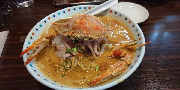 「丸ごと渡り蟹濃厚トマト味噌クリーム麺（限定）」@らー麺 あけどやの写真