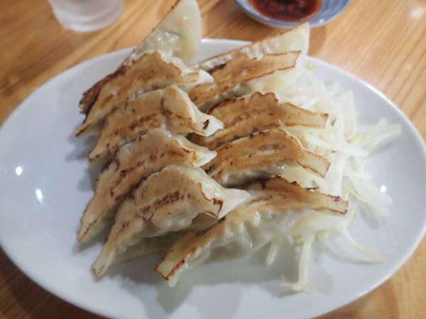 「焼餃子10個330円+定食」@のりぶんの写真