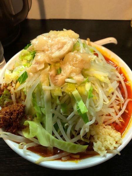 「辛麺　かため　アブラ　ニンニク少なめ」@豚星。の写真