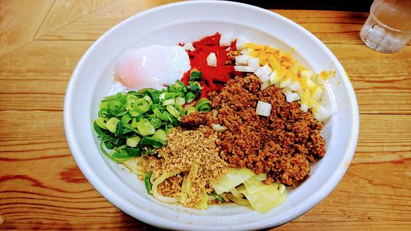 「カレー汁なし担々麺(並)+温玉」@自家製麺 てんかの写真
