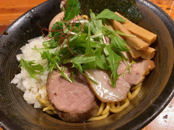 「比内地鶏のあぶらそば（味玉付き）」@瞠 池袋店の写真