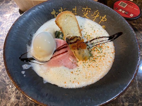 「牡蠣ラーメン（鯛出汁＋豆乳）味玉＋牡蠣ご飯」@ただいま、変身中。の写真