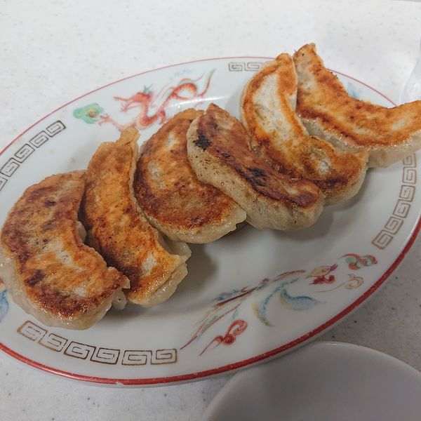 「スタミナラーメン600円、半スタカレー350円、餃子250円」@娘娘の写真