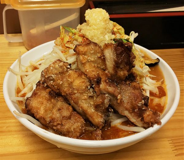 「極辛あんかけDX（メガ唐付)」@旨辛ラーメン 表裏 市ヶ谷本店の写真