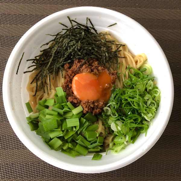 「＜TAKE OUT＞ 台湾まぜそば (追い飯付き) ￥850」@中華そば 四つ葉 東松山臨時店舗の写真