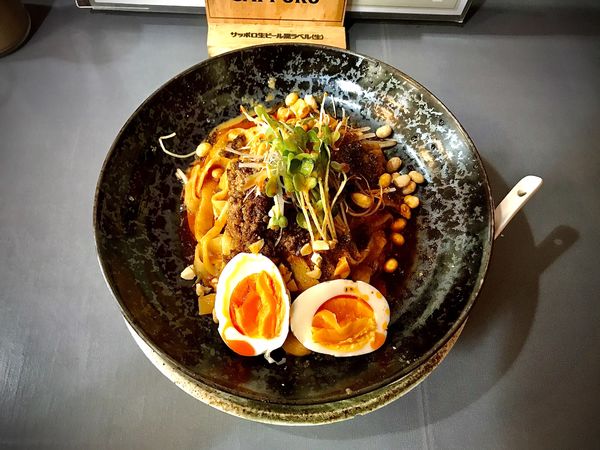 「汁なし坦々麺+味玉」@中国四川料理 錦水苑の写真