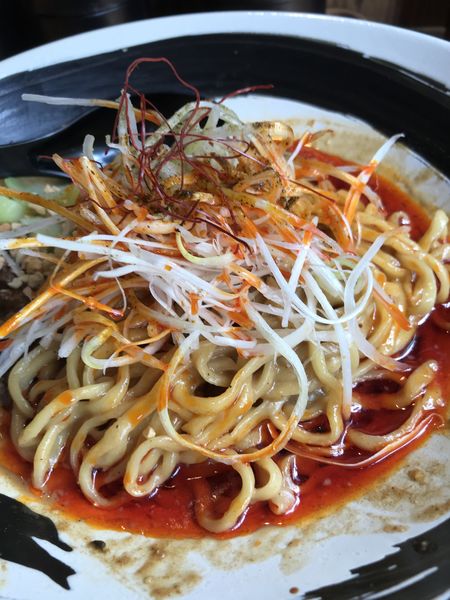 「汁無し担担麺 ¥930&エビス」@赤い鯨 人形町店の写真