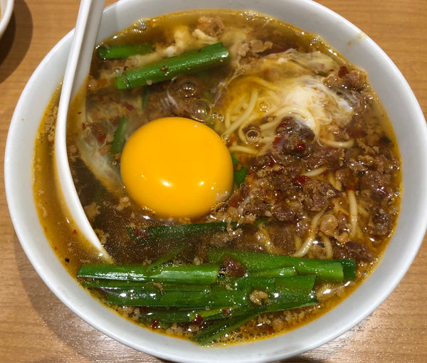 「台湾ラーメン生卵入り」@味仙 JR名古屋駅店の写真
